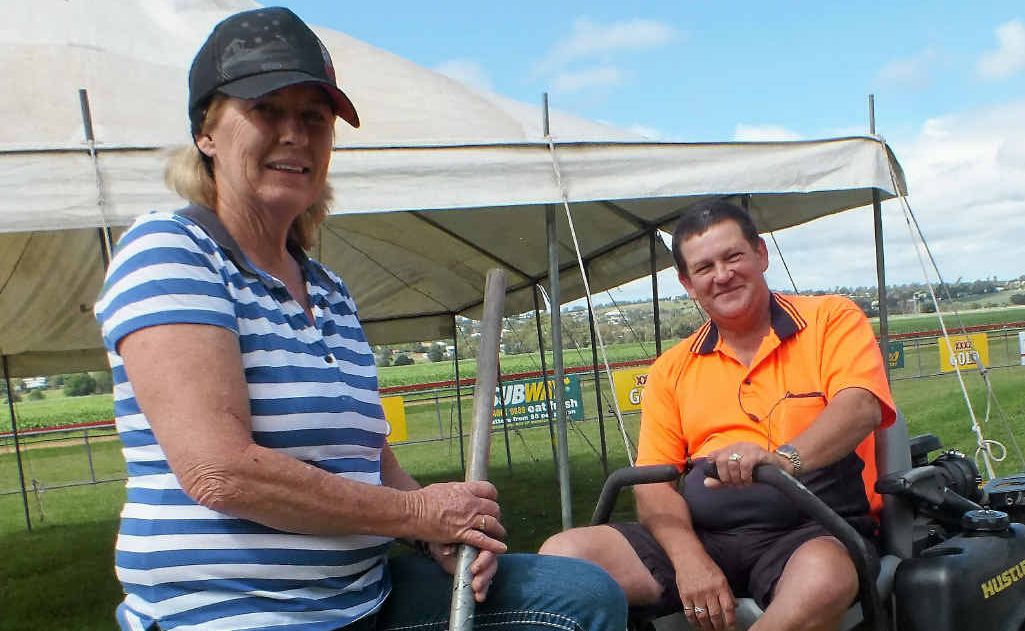 Allman Park caretakers Jackie and Dave Rossiter get the grounds in tip-top shape for today’s races. Allman Park caretakers Jackie and Dave Rossiter get the grounds in tip-top shape for today’s races.